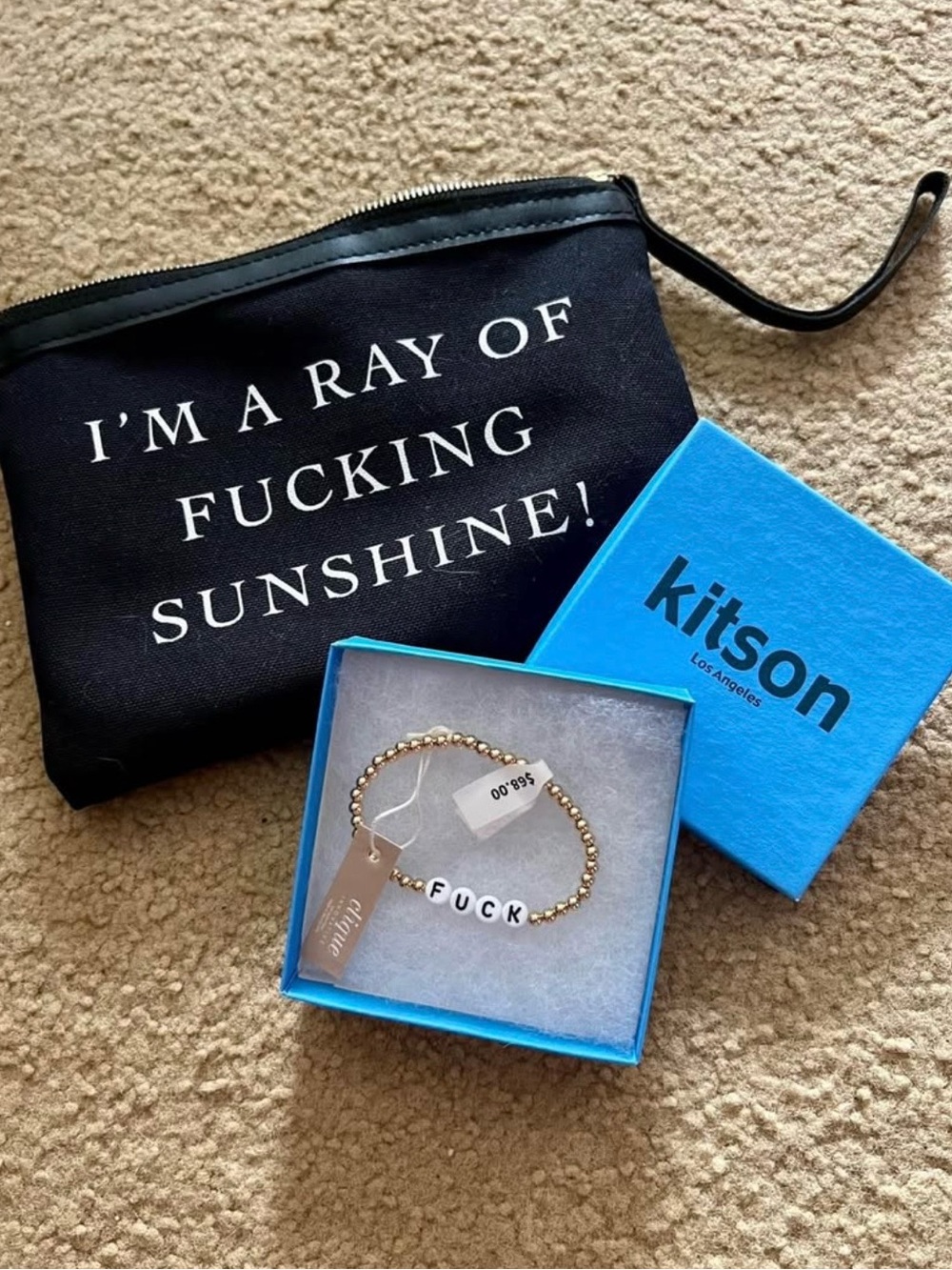 Kitson pouch and bead bracelet